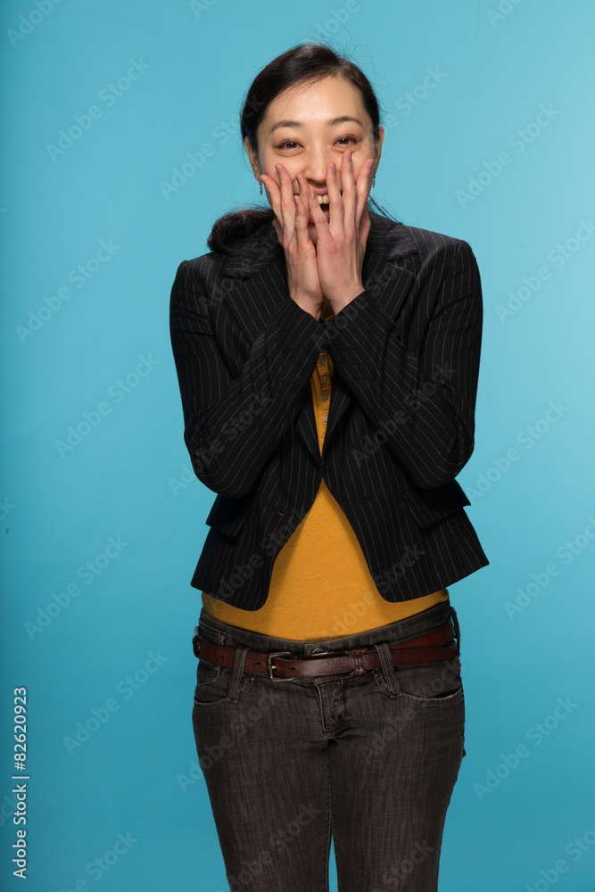 Young Asian woman in studio surprised reaction face Young Asian woman in studio surprised reaction face