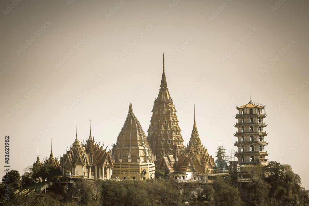 Fototapeta premium Retro stylized photo of Wat Tham Sua(Tiger Cave Temple), Tha Mou