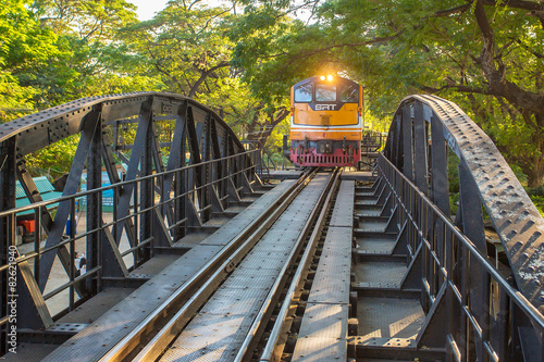 Kanchanaburi, Thailand - January 5, 2015: Train on the bridge ov