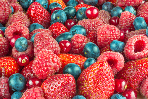 Fototapeta Naklejka Na Ścianę i Meble -  Mixed summer berries - background