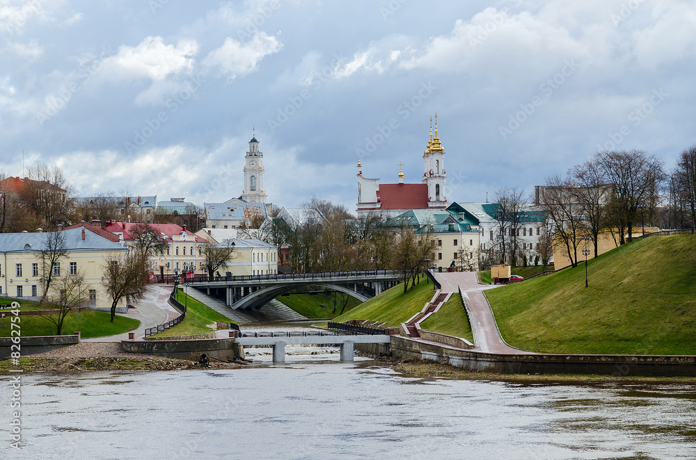 Obraz premium View of Town Hall and Voskresenskaya Church from estuary Vitba