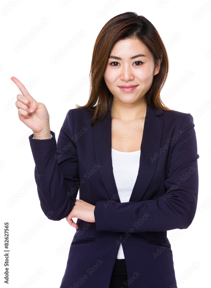 Young businesswoman with finger point up Young businesswoman with finger point up
