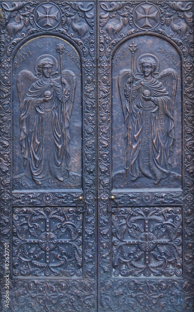 Metal door of Church - Angels