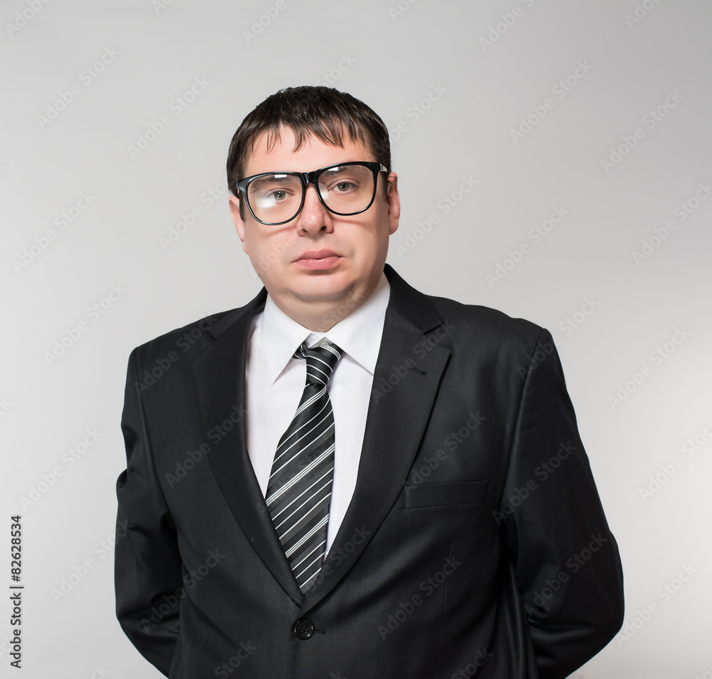 Portrait of a young businessman, with glasses Portrait of a young businessman, with glasses