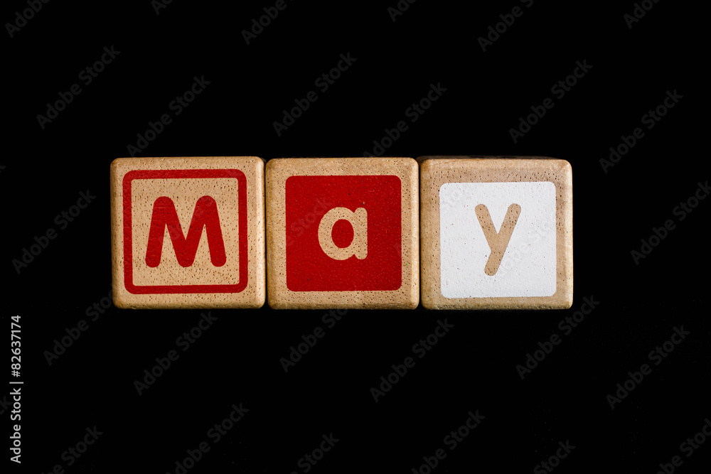may on wood Cubic on black background may on wood Cubic on black background