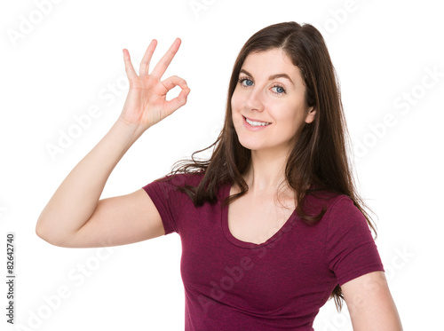 Caucasian woman with ok gesture