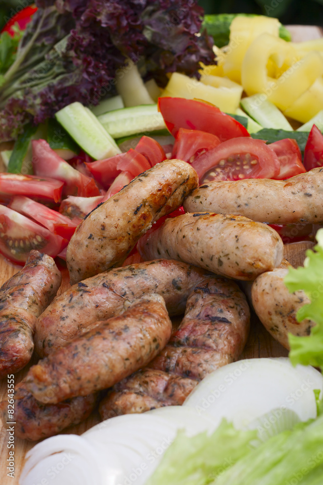 grilled sausage, fresh herbs, tomatoes, onions grilled sausage, fresh herbs, tomatoes, onions