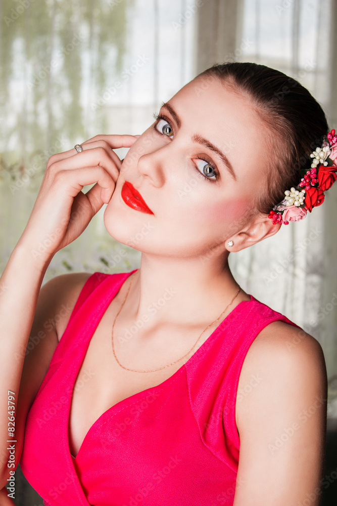 Portrait of a beautiful blonde woman with flowers in her hair Portrait of a beautiful blonde woman with flowers in her hair