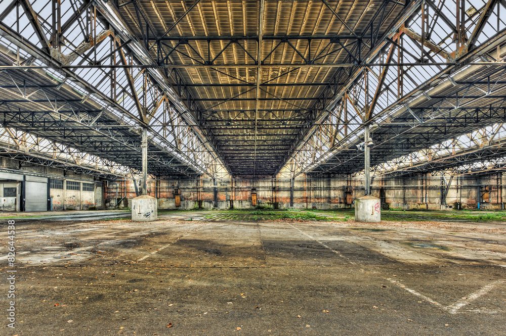 Empty warehouse in an abandoned factory Empty warehouse in an abandoned factory