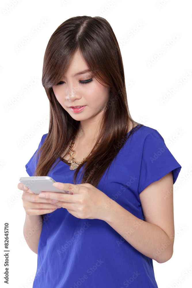 Pretty Asian girl texting with smartphone, isolated on white Pretty Asian girl texting with smartphone, isolated on white