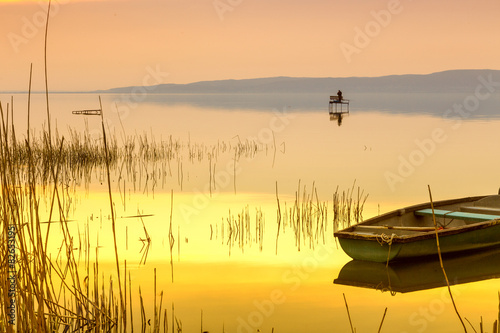 Photography Sunset on the lake Balaton with a boat
