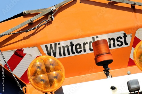 Winterdienst Schriftzug am Heck eines Streufahrzeugs photo