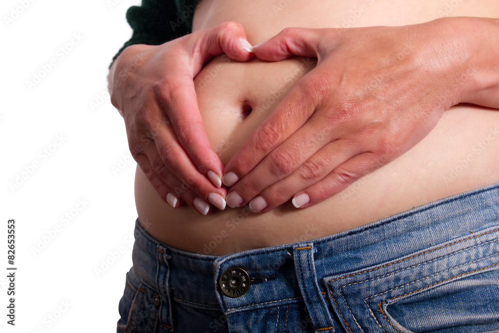 Fototapeta premium Herzform auf dem Schwangeren Bauch