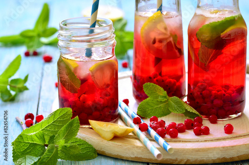 Cold redcurrant tea with lemon and mint. photo