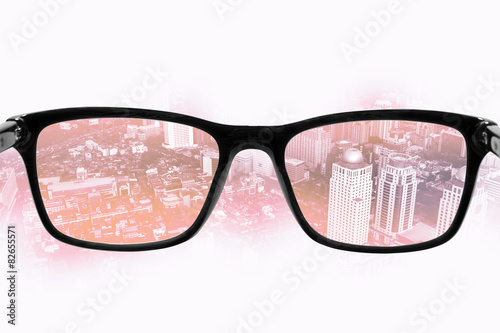 business city seen through the eyepieces