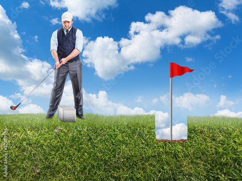 Businessman playing golf