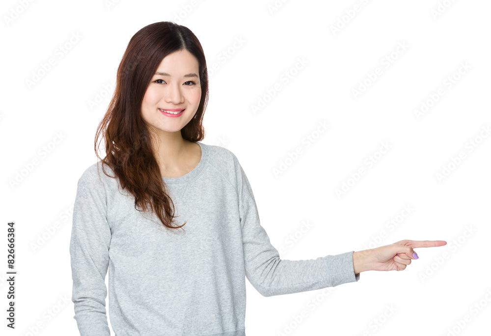 Asian woman with finger point aside Asian woman with finger point aside