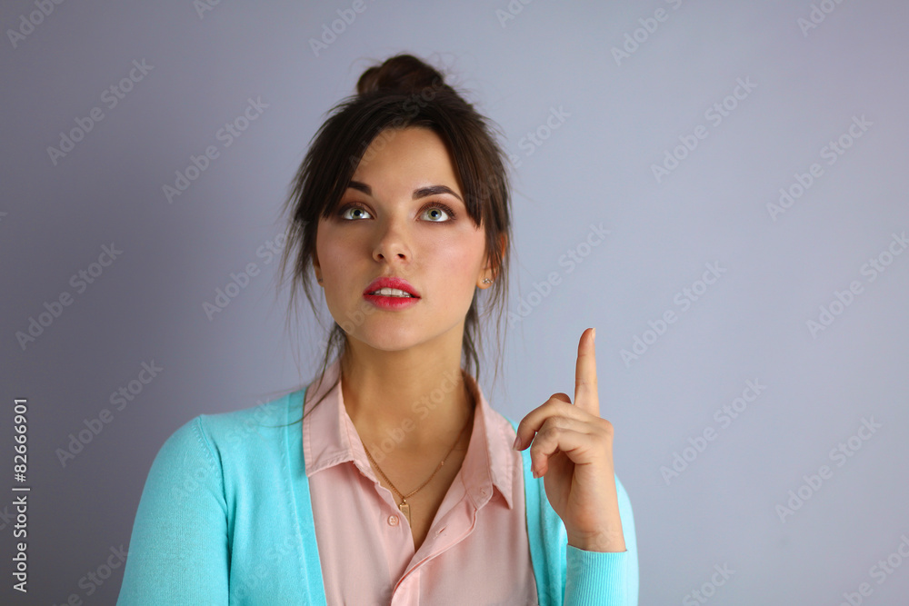 Portrait of an attractive fashionable young brunette woman