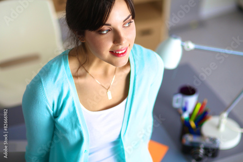 Portrait of tired young business woman with laptop computer Free Download Portrait of tired young business woman with laptop computer - GFXLoad