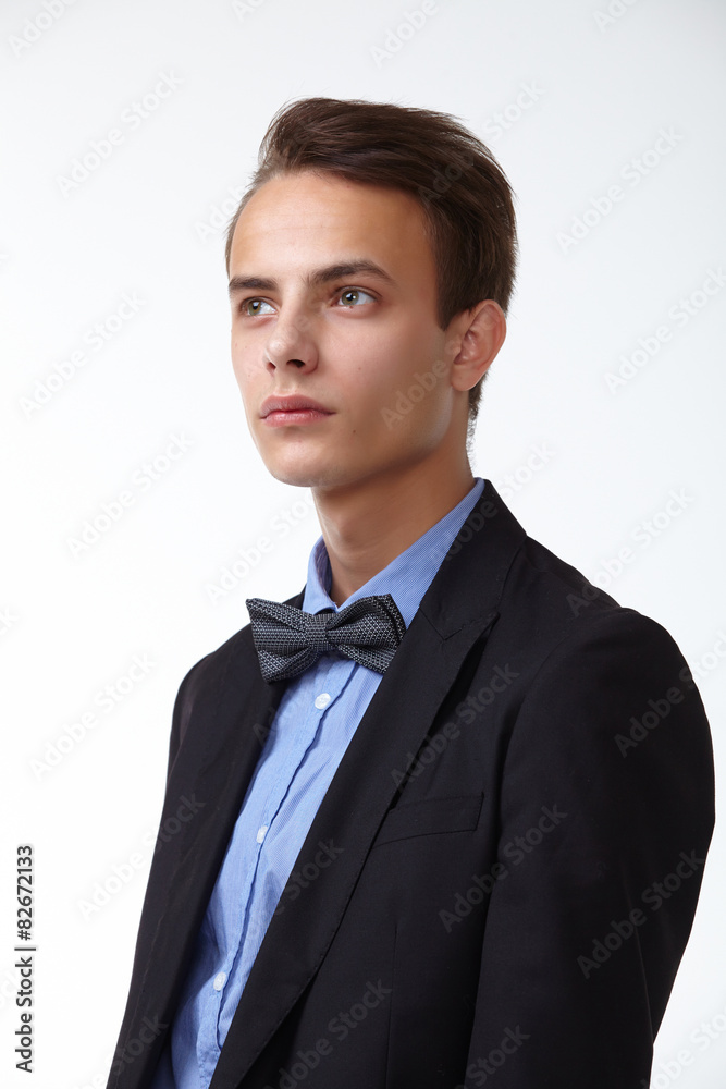 young handsome man in elegant suit with butterfly young handsome man in elegant suit with butterfly