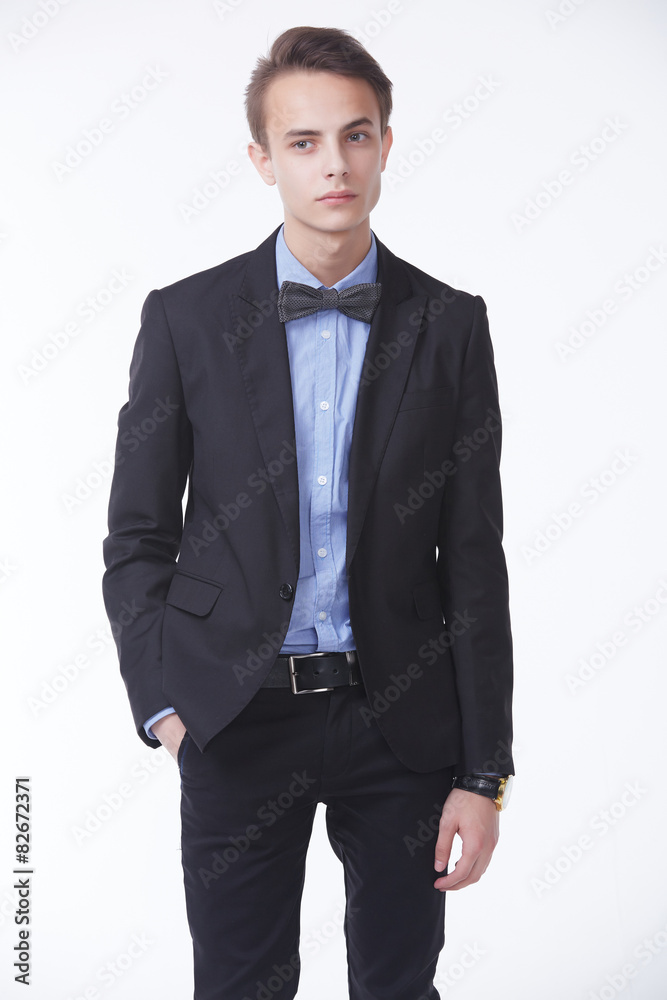 young handsome man in elegant suit with butterfly young handsome man in elegant suit with butterfly