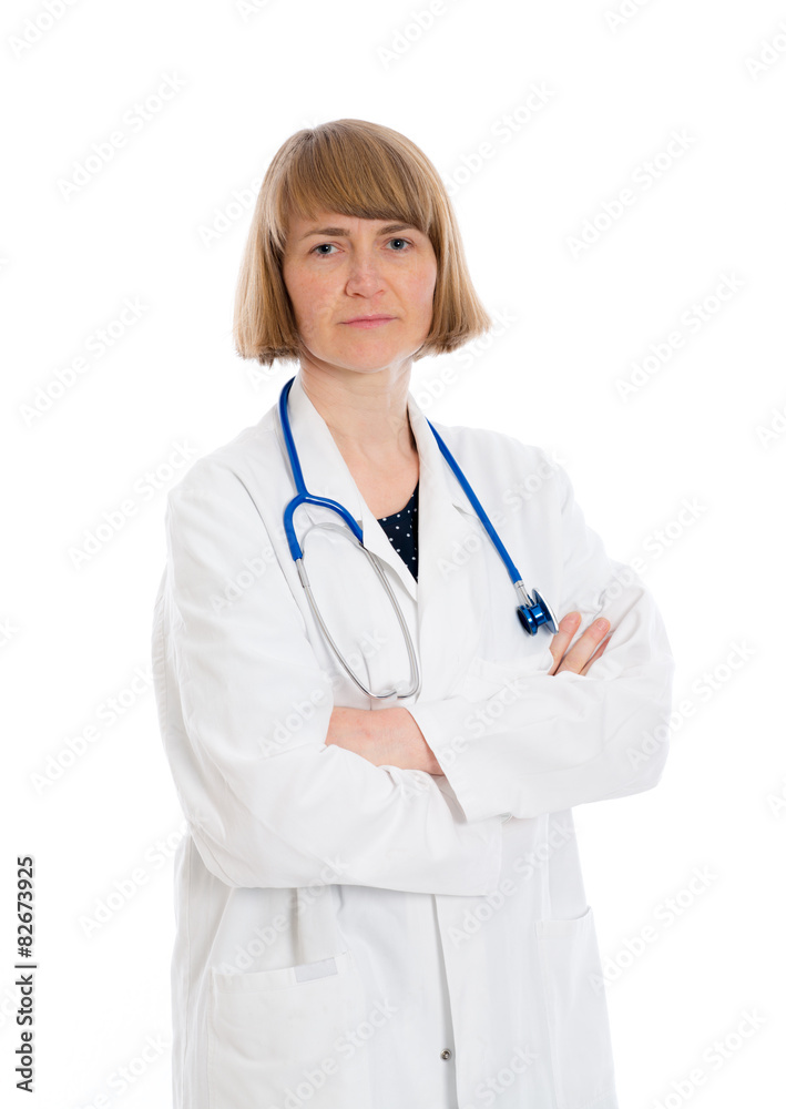 young female doctor with crossed arms young female doctor with crossed arms