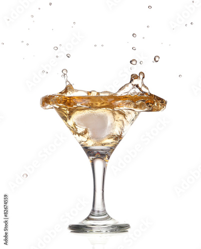 alcohol cocktail with splash of ice isolated on white