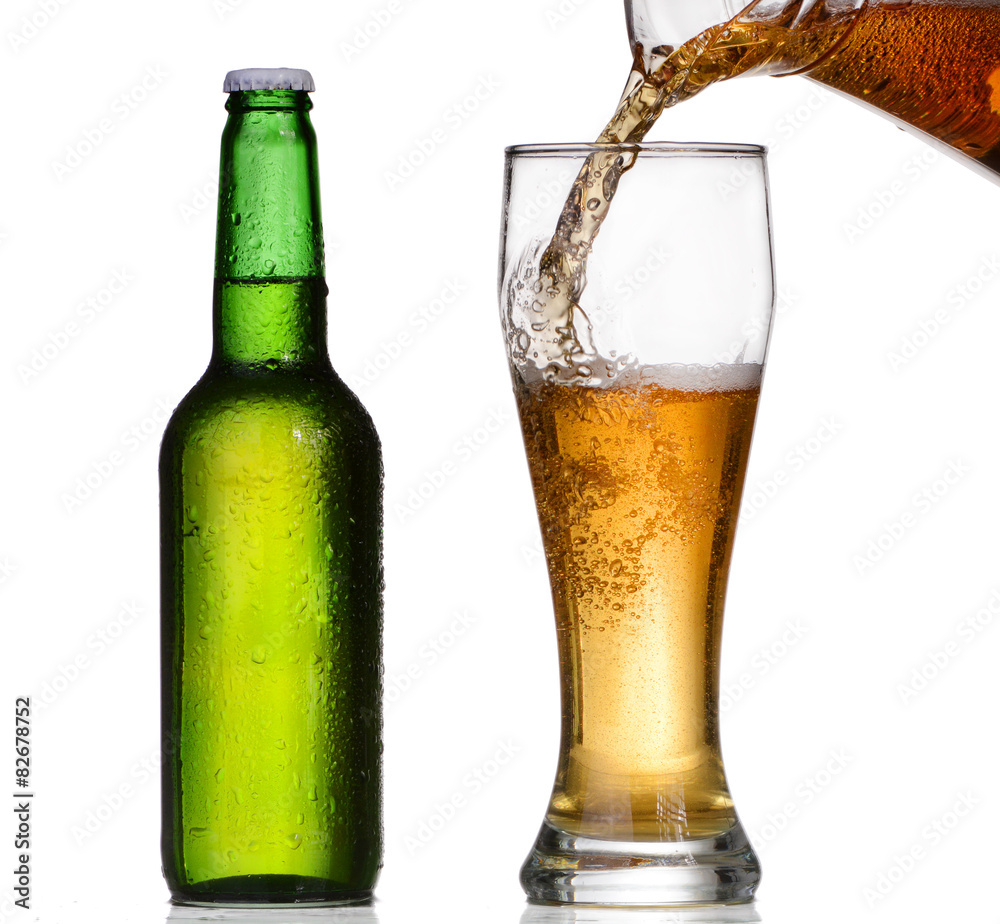 Chilled green bottle with condensate and a glass of beer Chilled green bottle with condensate and a glass of beer
