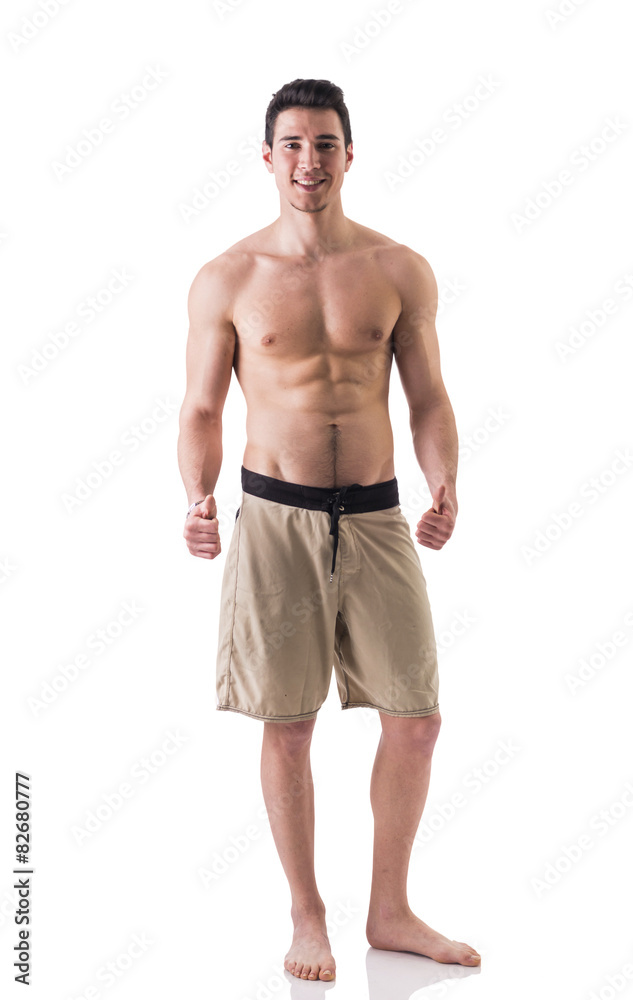 Fototapeta premium Full figure shot of handsome shirtless young man