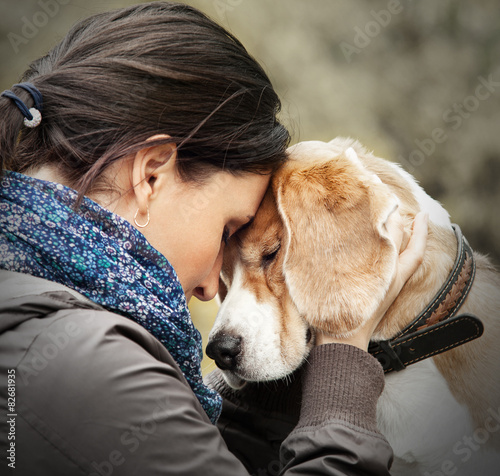 Woman with her dog tender scene