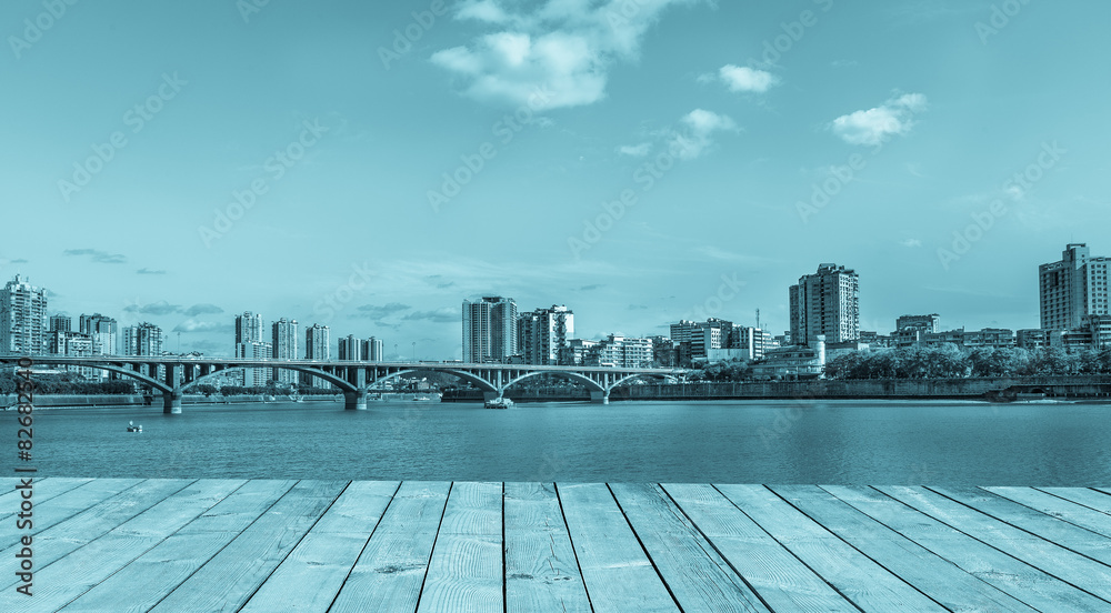 Naklejka premium modern city with river