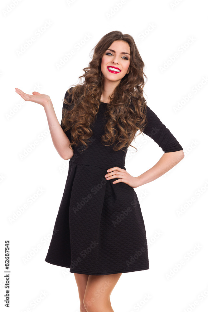 Fashion Model in Black Mini Dress Presenting Product Fashion Model in Black Mini Dress Presenting Product