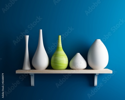 vase on shelf with blue wall interior