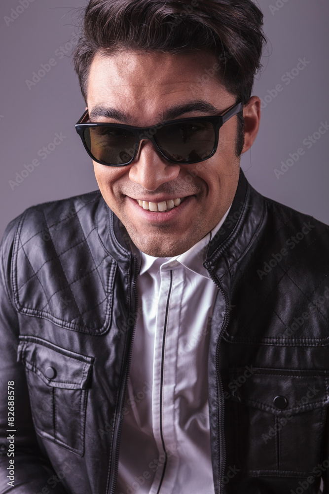 Fototapeta premium smiling handsome man wearing black sunglasses.