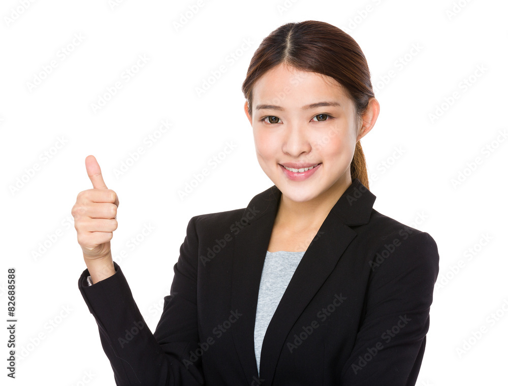 Asian businesswoman with thumb up gesture Asian businesswoman with thumb up gesture
