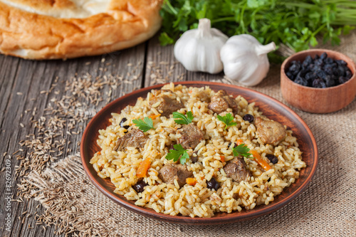 Arabic traditional rustic rice food pilaf cooked with fried meat