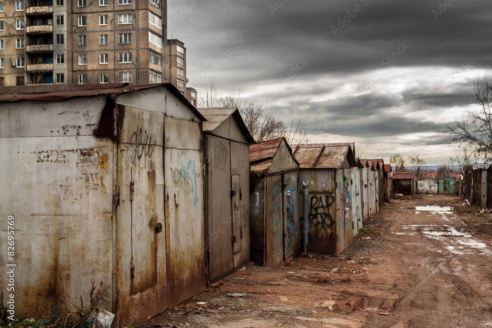 Vandalized Garages and Dark Spring Skies