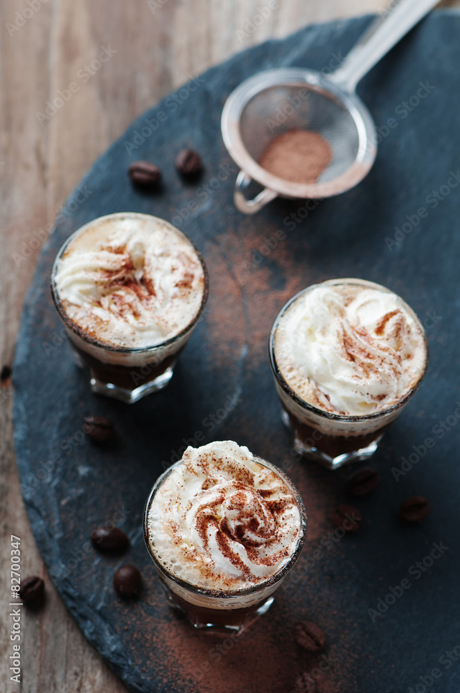 Delicious coffee with crean and cocoa Delicious coffee with crean and cocoa