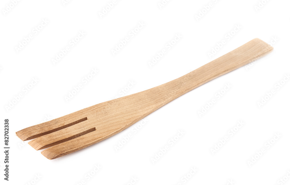 Used wooden fork spatula isolated