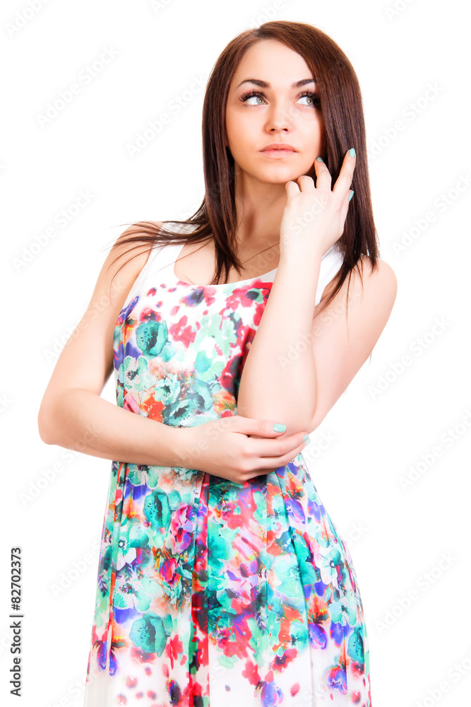 Beautiful young woman in a bright many-colored dress Beautiful young woman in a bright many-colored dress