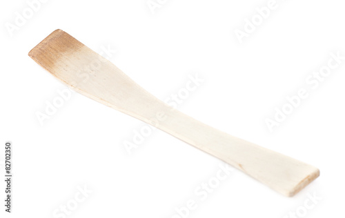 Used wooden spatula tool isolated
