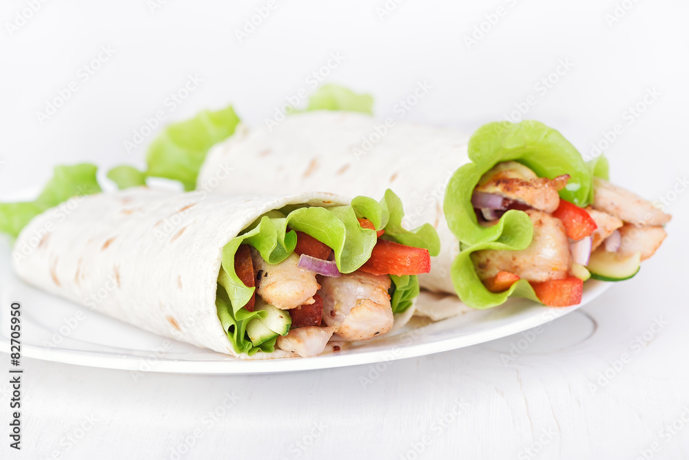 Wrap sandwiches with chicken and vegetables Wrap sandwiches with chicken and vegetables