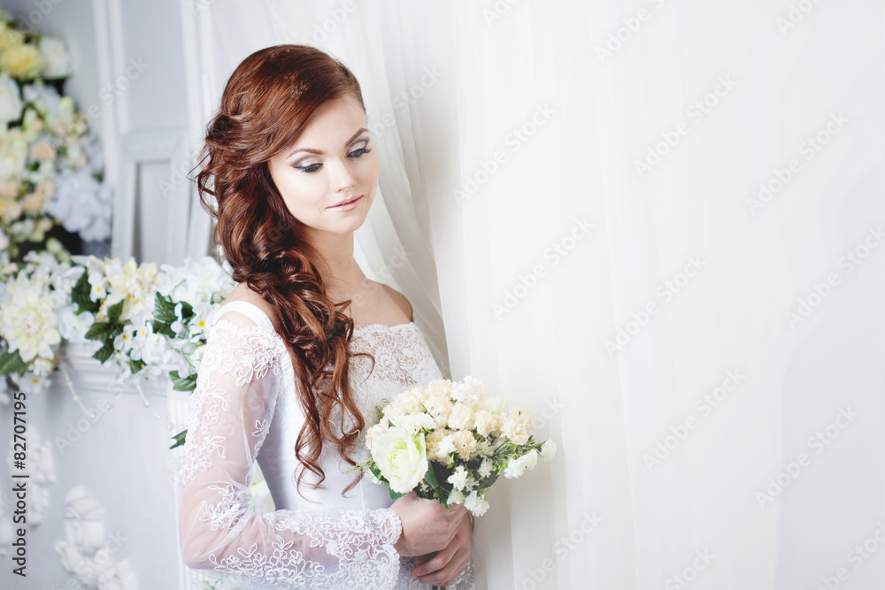 beautiful smiling woman in a wedding dress. Place for text beautiful smiling woman in a wedding dress. Place for text