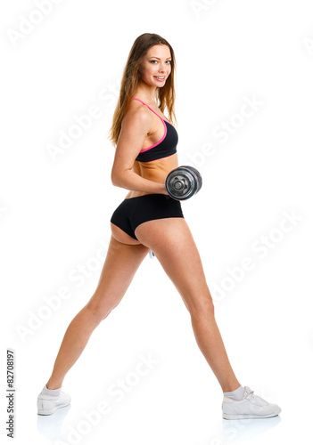 Beautiful sport woman with dumbbells doing sport exercise, isola