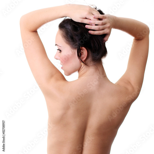 Skincare concept: back of beautiful nude woman