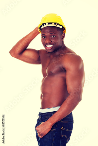 Black naked man wearing helmet