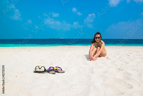 Woman is relaxing on the tropical beach  Maldives