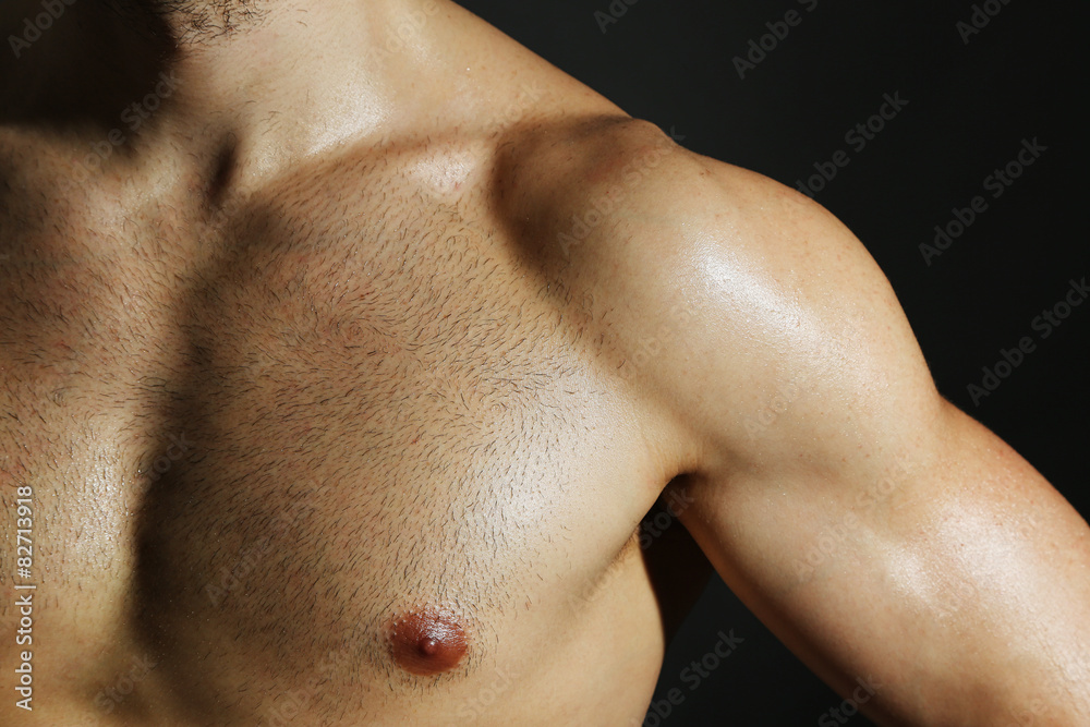 Fototapeta premium Muscle young man close up