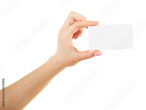 Female hand holding card isolated on white