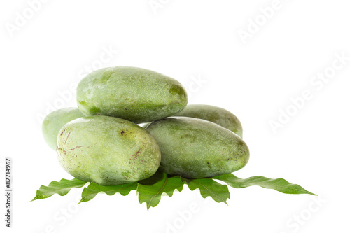 Close up green mango with leaf isolated on white